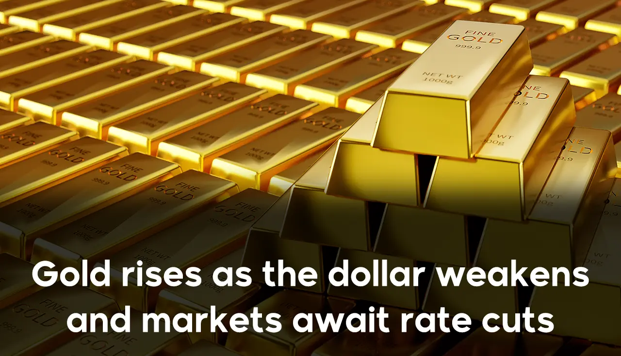 Gold rises as the dollar weakens and markets await rate cuts